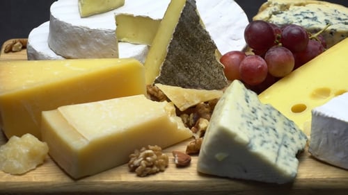 Elegant Cheese Platter with Grapes and Walnuts