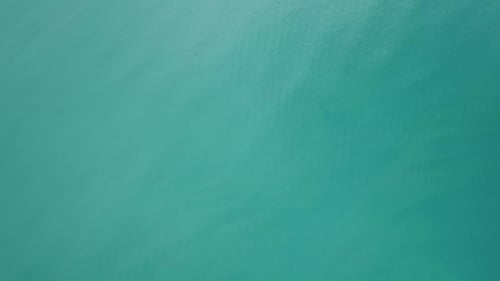 Flying Over Tropical Sea Water Surface