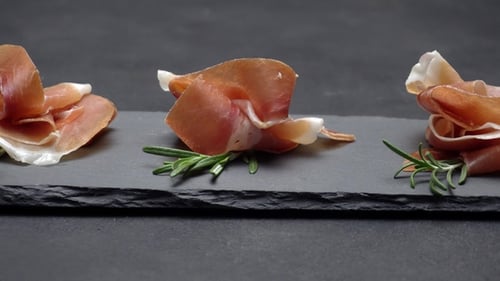 Close Up of Cured Meat Appetizer with Rosemary