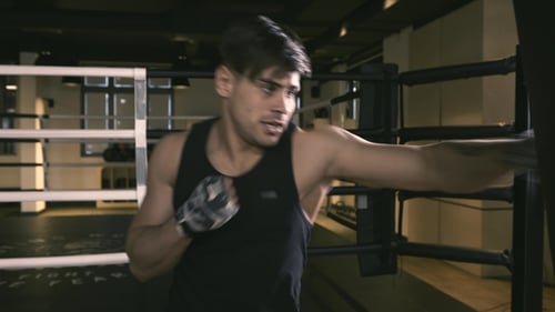Male Boxer Training in Boxing Club