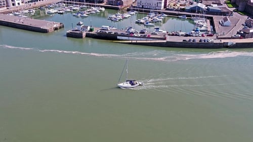 Sailing Ship Leaving Caernarfon, Gwynedd in Wales - United Kingdom
