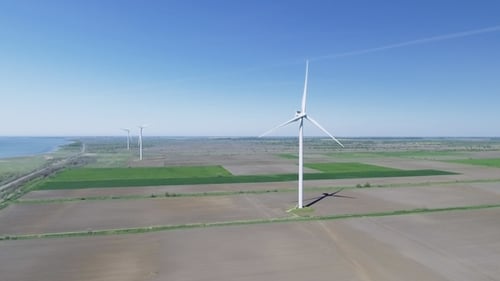 Wind Electric Generator - Power Stations in Field. Aerial View