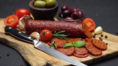 Cured Sausage with Tomatoes and Olives Still Life