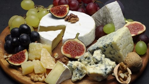 Appetizing Cheese, Fruit and Nut Platter Close-Up