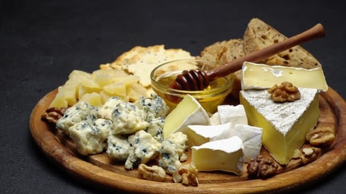Appetizing Cheese Board Display with Gourmet Cheeses