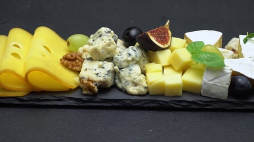Gourmet Cheese Board Display With Various Cheeses