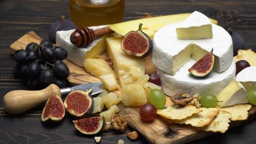 Gourmet Cheese and Fruit Still Life Arrangement