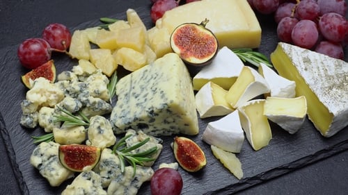 Delicious Cheese Board with Figs and Grapes