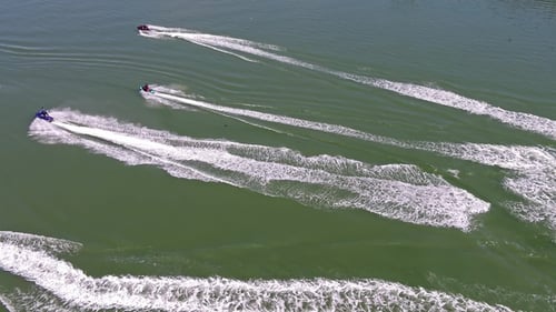 Friends Enjoying Jet Skiing at the Coast of Wales in United Kingdom