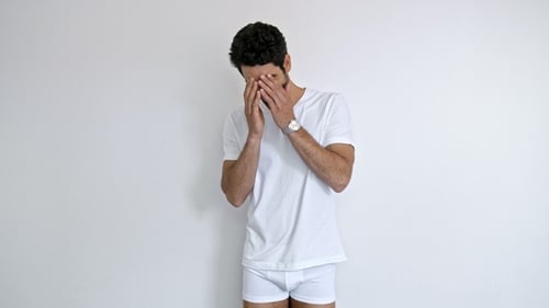 Attractive Man Posing in White T-Shirt and Underwear