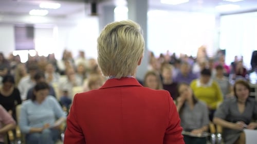 the Speaker Tells the Speech at Conference. Business People Seminar Conference Meeting Office