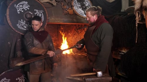 Medieval Men Forging a Sword with Fire