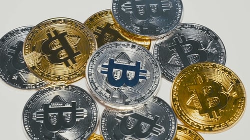 Pile of Gold and Silver Bitcoin Cryptocurrency Coins