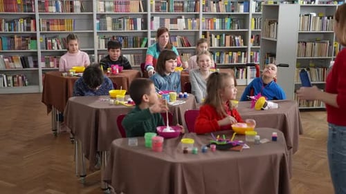 Children Enjoying Art Class in School Library