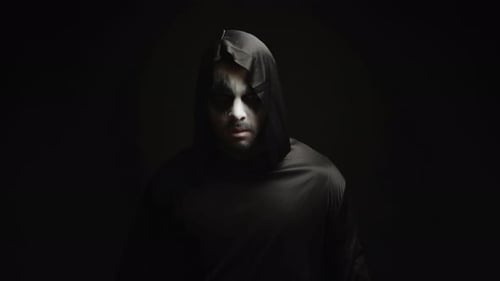 Creepy Man in Hooded Robe with Face Paint
