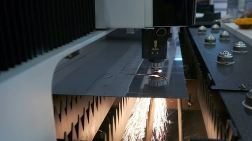 Industrial Robotic Laser Cutter Cuts Metal Parts with Great Precision