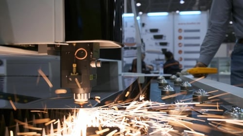 Laser Cutting Metal Sparks in Industrial Setting
