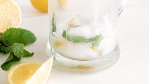 Refreshing Lemon and Mint Drink Preparation