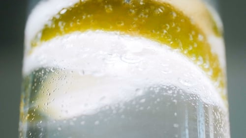 Refreshing Sparkling Water with Lime Slice Close-Up