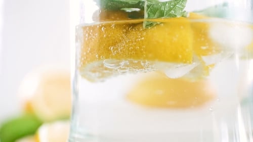 Refreshing Lemon Water with Mint and Ice Cubes