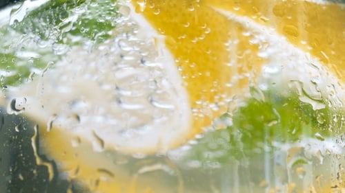 Lemon Lime Beverage with Water Droplets Close Up
