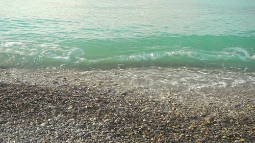 Blue Tropical Water Waves on the Beach