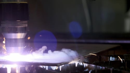 Industrial Robotic Laser Cutter Cuts Metal Parts with Great Precision