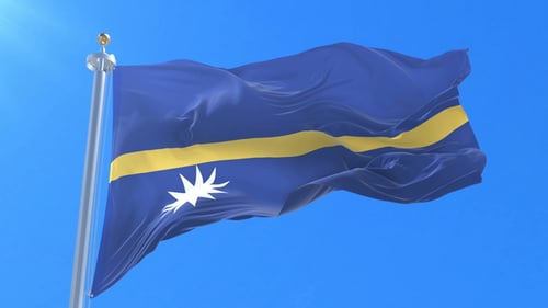 Fluid Waving Flag of Nauru Against a Clear Blue Sky