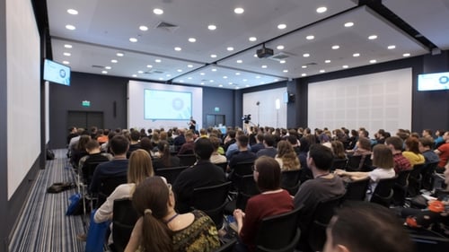 Speaker Addresses Audience at Corporate Technology Conference