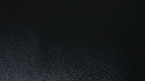 Wasserspray vor schwarzem Hintergrund aufgenommen mit 1000 Bildern pro Sekunde. Schuss auf Phantom Flex.