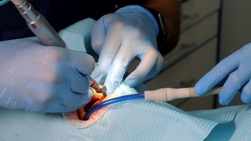 Dentist Performing Meticulous Dental Procedure Close Up