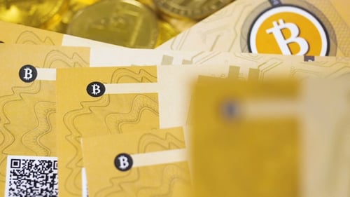 Bitcoin Card and Gold Coin Close Up
