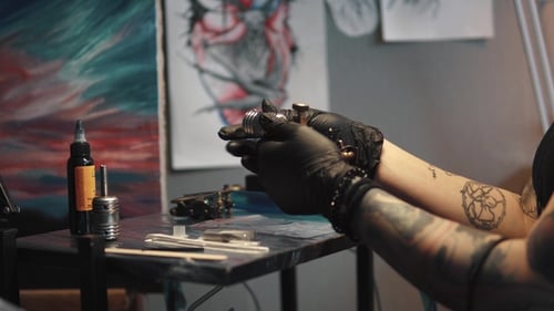 Tattoo Artist Assembles Tattoo Gun in Studio