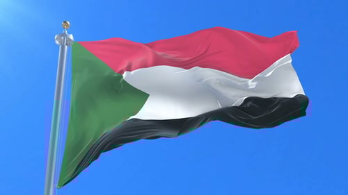 Realistic Waving Sudan Flag Against Clear Blue Sky