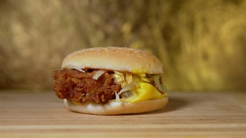 Tasty Burger with Crispy Patty, Cheese, and Lettuce