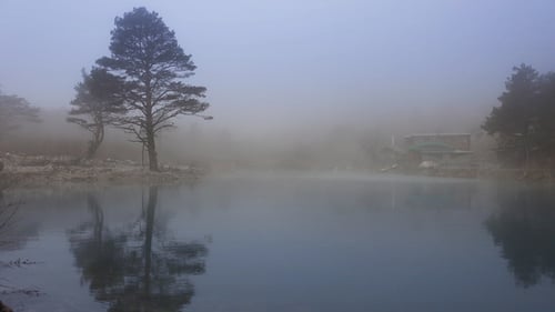 Landscape with Lake Covered with Thick Fog