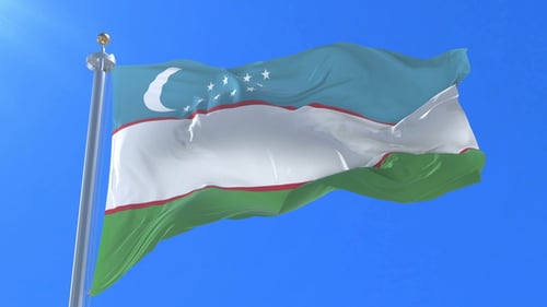 Realistic Waving Uzbekistan Flag on a Pole Against Blue Sky