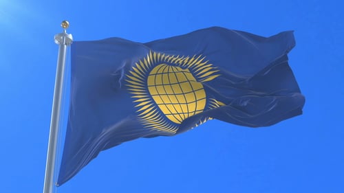 Commonwealth Flag Waving Seamless Loop in Blue Sky