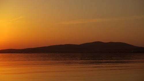 Beautiful Sunset Over Mountains Lake, Calm Water