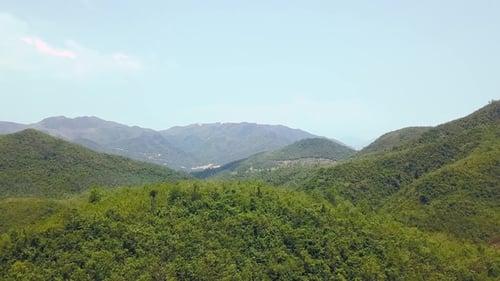 Mountain Valley Covered Green Forest Aerial Landscape. Green Mountains with Tropical Trees