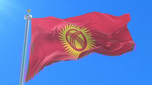 Kyrgyzstan Flag Waving Proudly in Bright Blue Sky