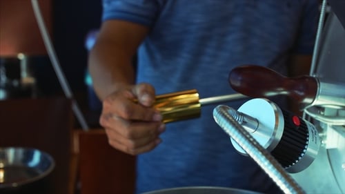 Operating a coffee roasting machine in daytime