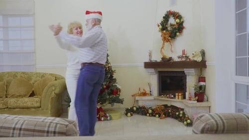 Senior Couple Dancing at Christmas Time