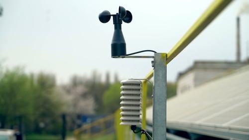 Meteorological Instrument Used To Measure Wind Speed and the Solar Cell System. Solar Farm