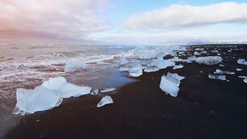 Jokulsarlon Glacier Lagoon, Fantastic Sunset on the Black Beach, Iceland