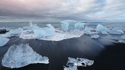 Jokulsarlon Glacier Lagoon, Fantastic Sunset on the Black Beach, Iceland