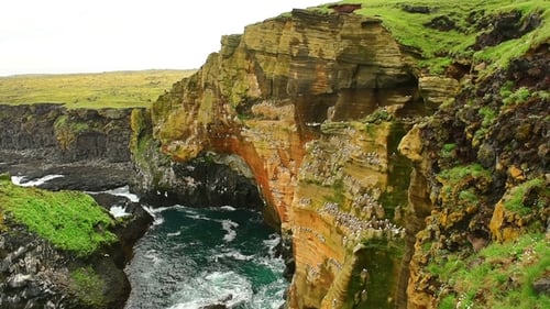 Noisy Water Under a Rock. Ocean in the Iceland