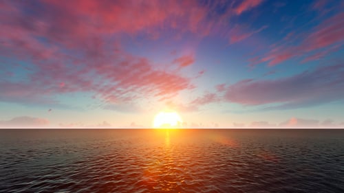 Sunrise Over Calm Ocean
