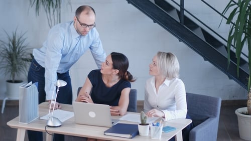Startup Business Team on Meeting in Modern Bright Office Interior Brainstorming, Working on Laptop