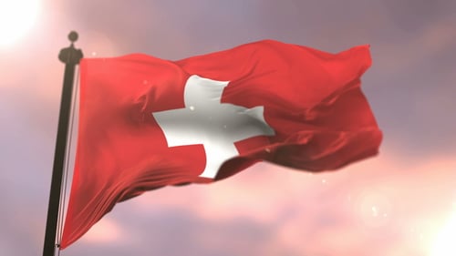 Flagge der Schweiz bei Sonnenuntergang